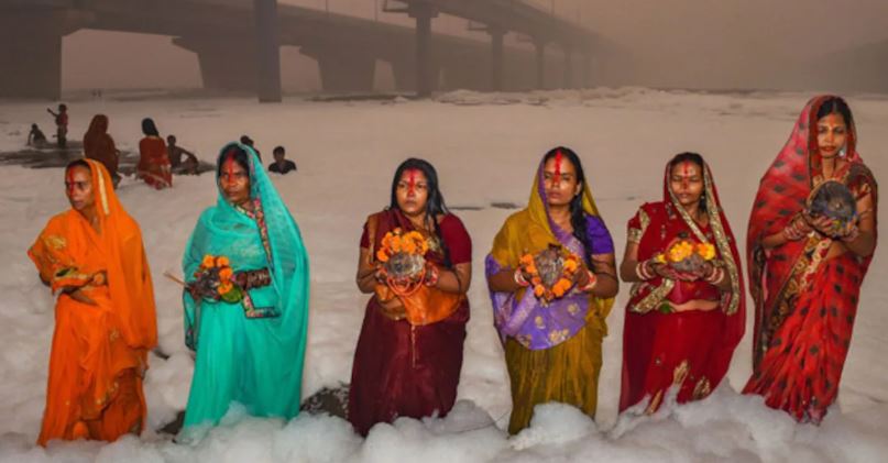 Delhi Devotees Observe Chhath Puja Amidst Knee-Deep Toxic Foam in Yamuna