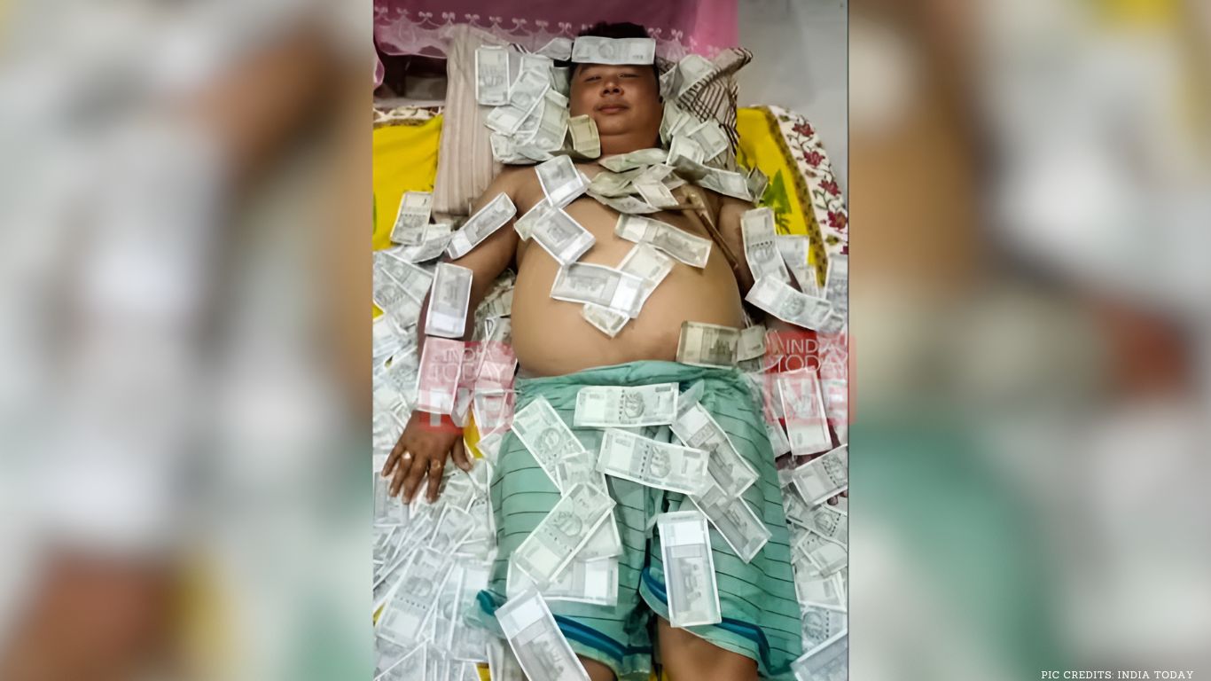 UPPL Member Photographed Sleeping on Piles of Rs 500 Notes in Assam