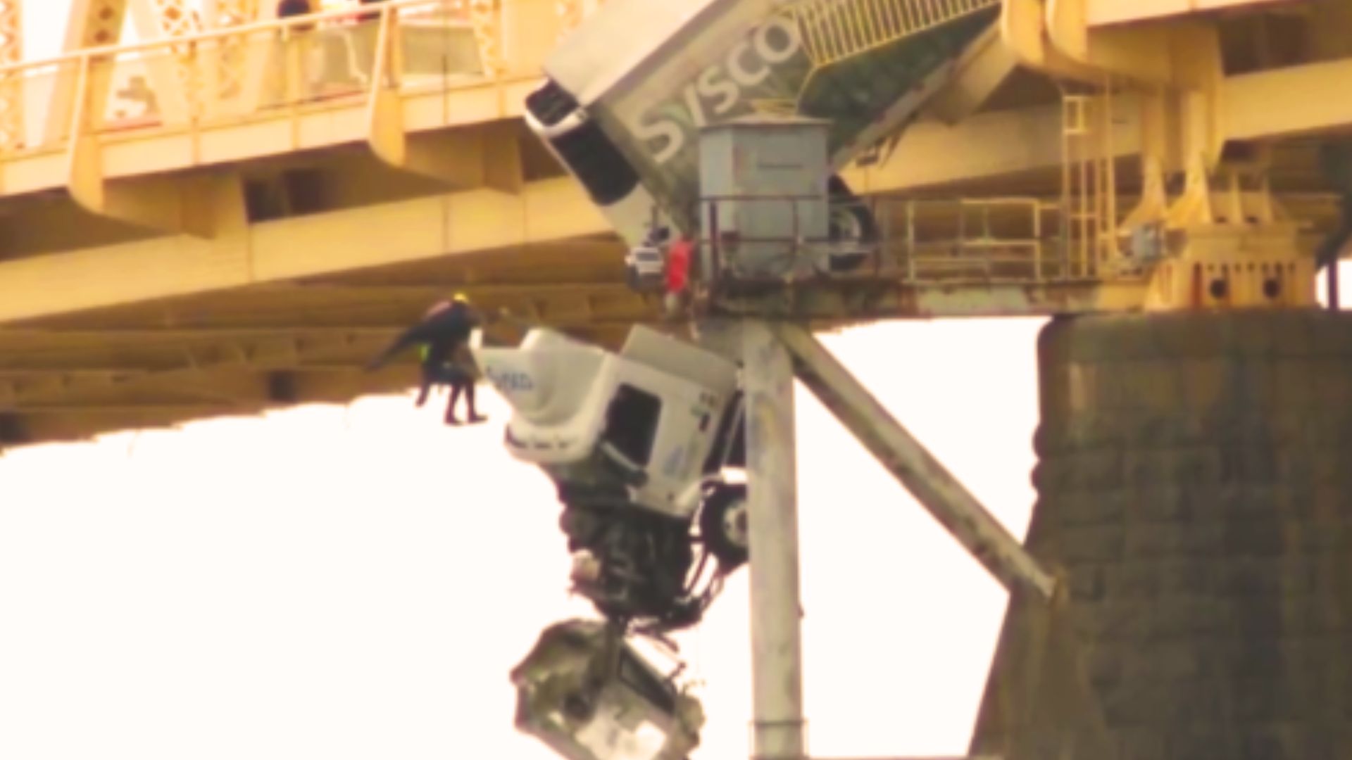 Watch: Woman Saved from Hanging Truck on US Bridge