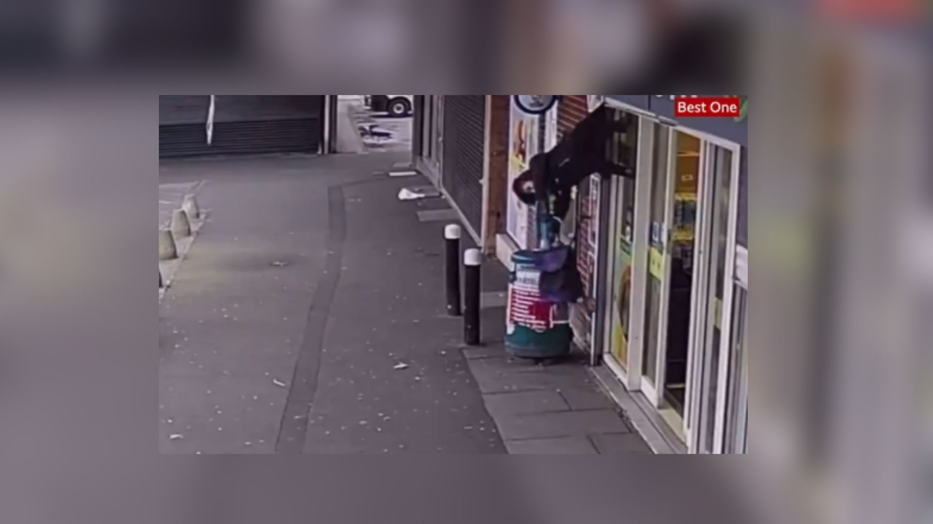 Woman Gets Caught in Shop Shutters and Lifted Into the Air