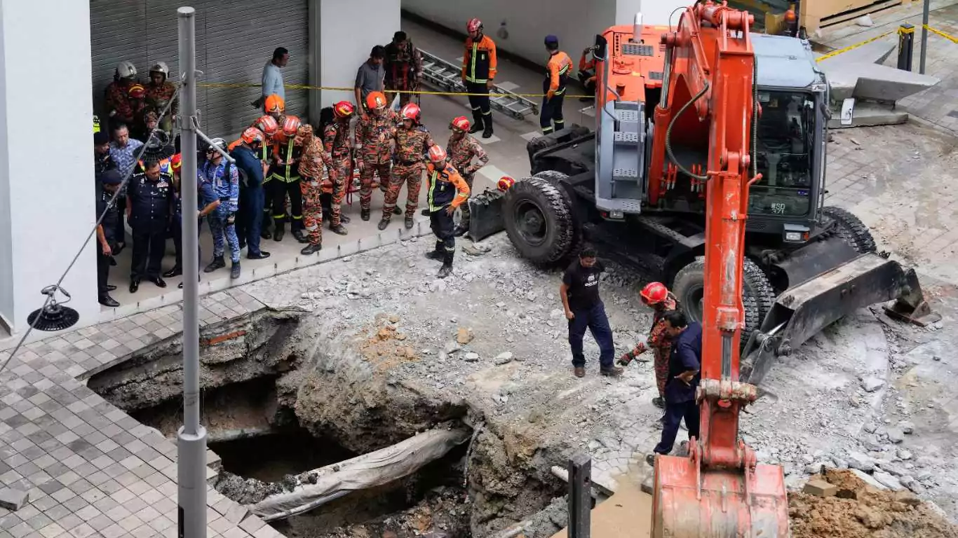 Indian Tourist Disappears In Sinkhole Collapse In Kuala Lumpur; Search Efforts Intensify