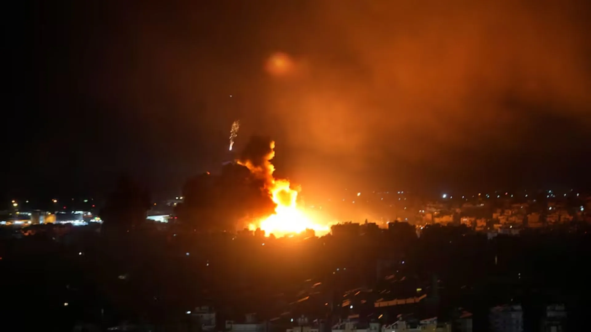 Israeli Airstrikes Hit Southern Beirut, Sever Key Crossing Into Syria