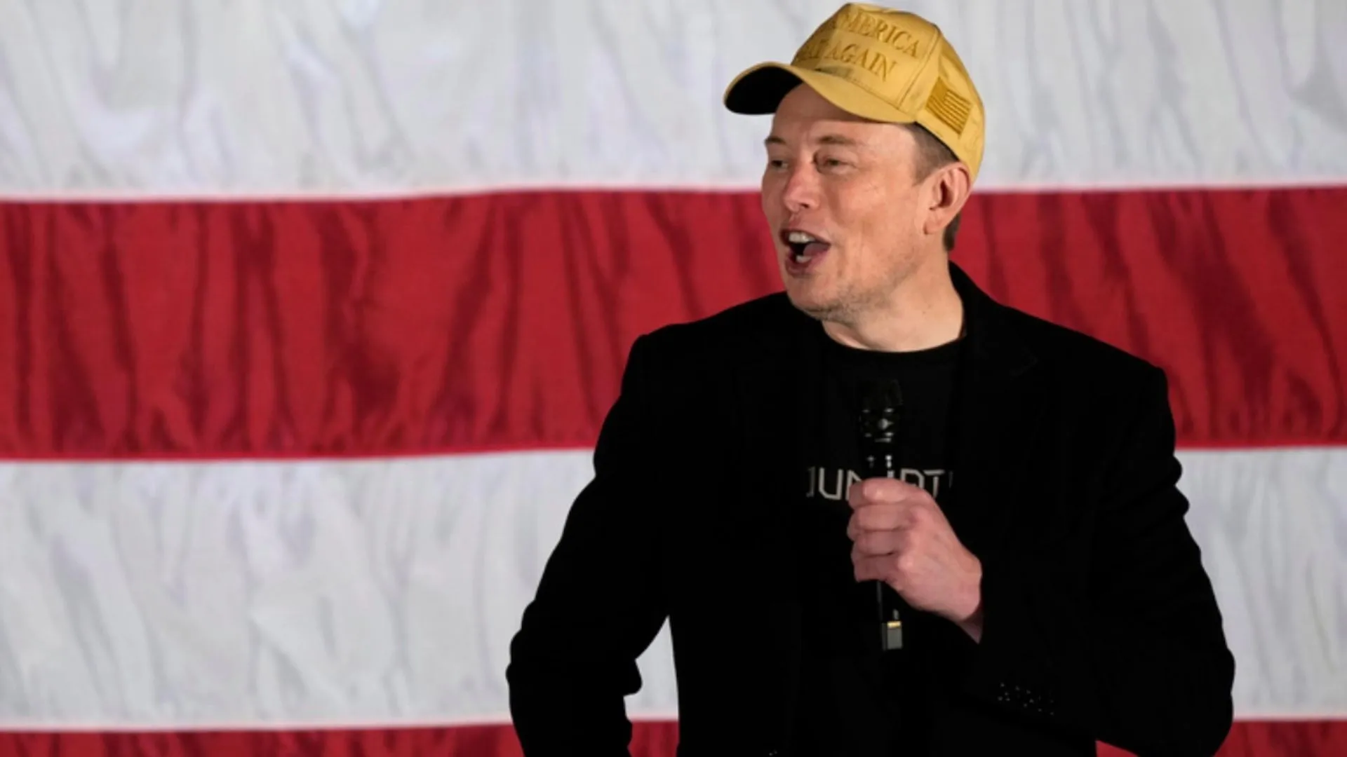 Musk Responds to Biden’s Jabs: ‘Puppet’ or Not, I’m Here to Stay