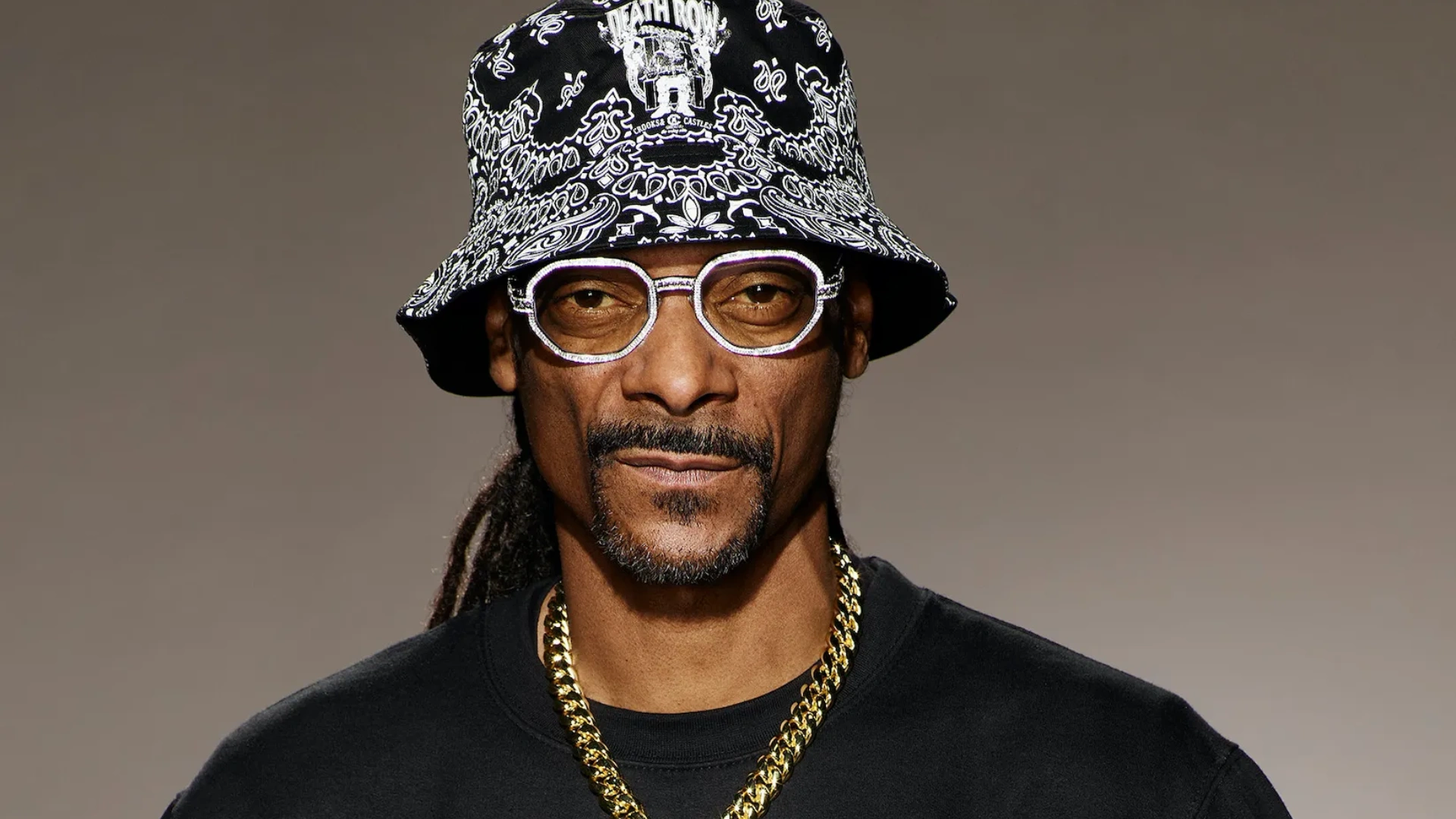 ‘Still A Black Man. Still 100% Black,’ Says Snoop Dogg After Hitting Back At Haters Over Performing At Trump’s Crypto Ball